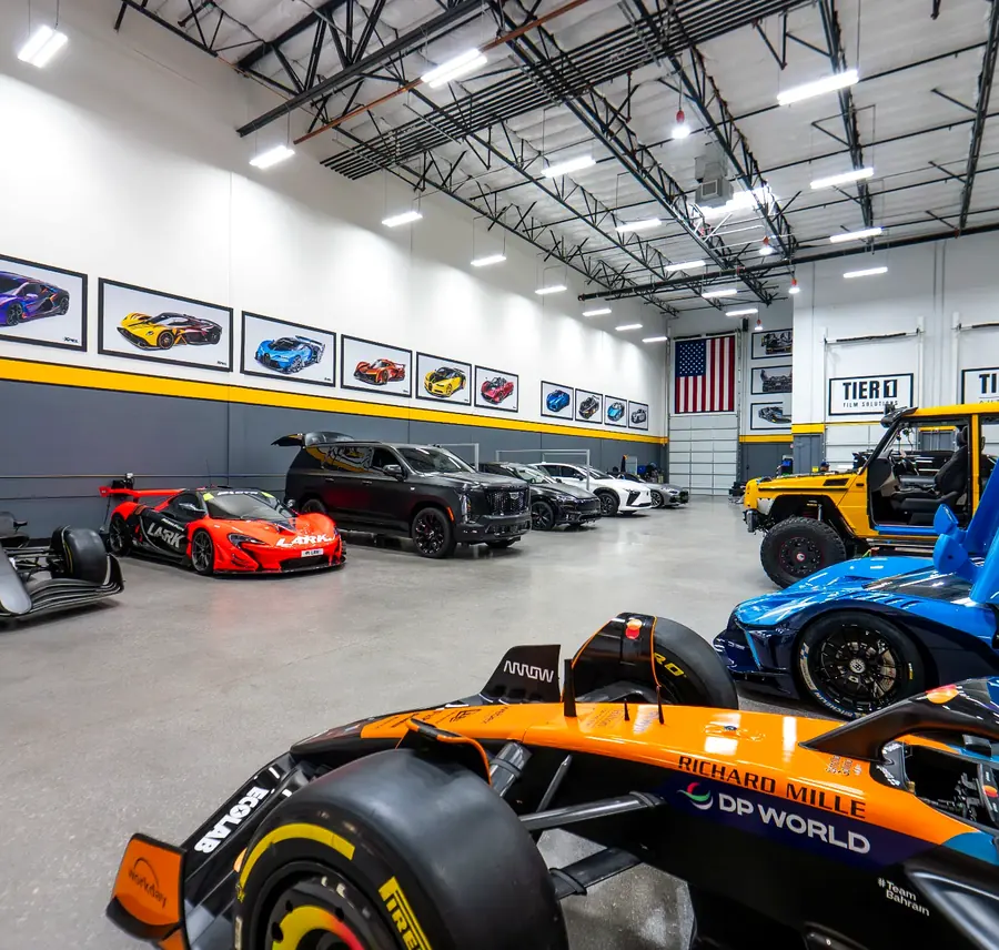 Tier 1 Autohaus professional install bay with performance vehicles